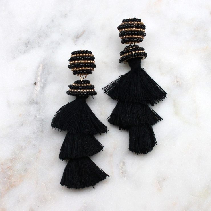 A photo of the Dreamy Duster Earrings product