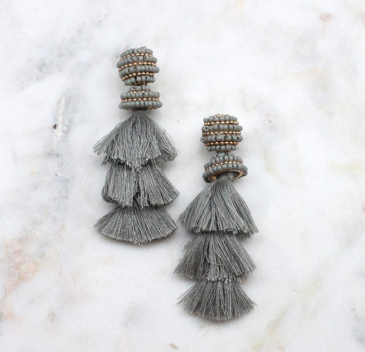 A photo of the Dreamy Duster Earrings product