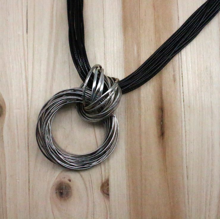 A photo of the Working Miracles Necklace product