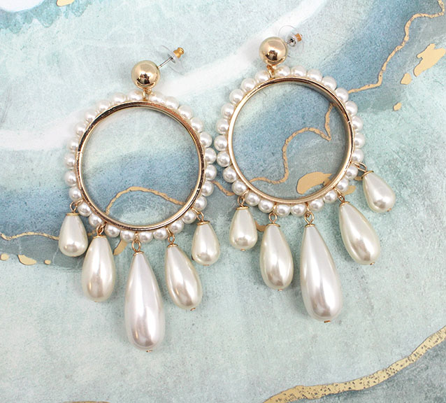 A photo of the Pearl Drops Earrings product