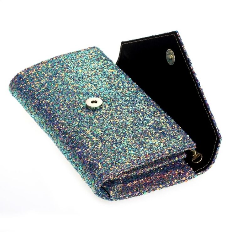 A photo of the Iridescent Space Glitter Clutch product
