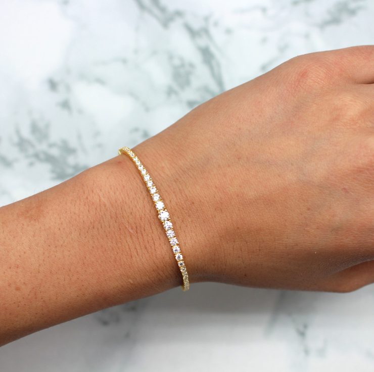 A photo of the Graduate Sterling Silver Gold Plated Adjustable Bracelet product
