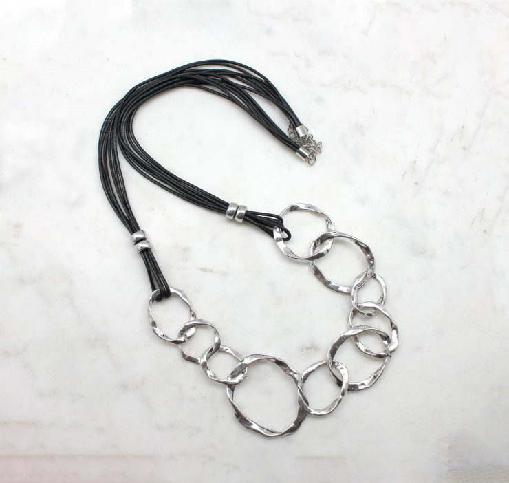 A photo of the Chain Link Reaction Cord Necklace product