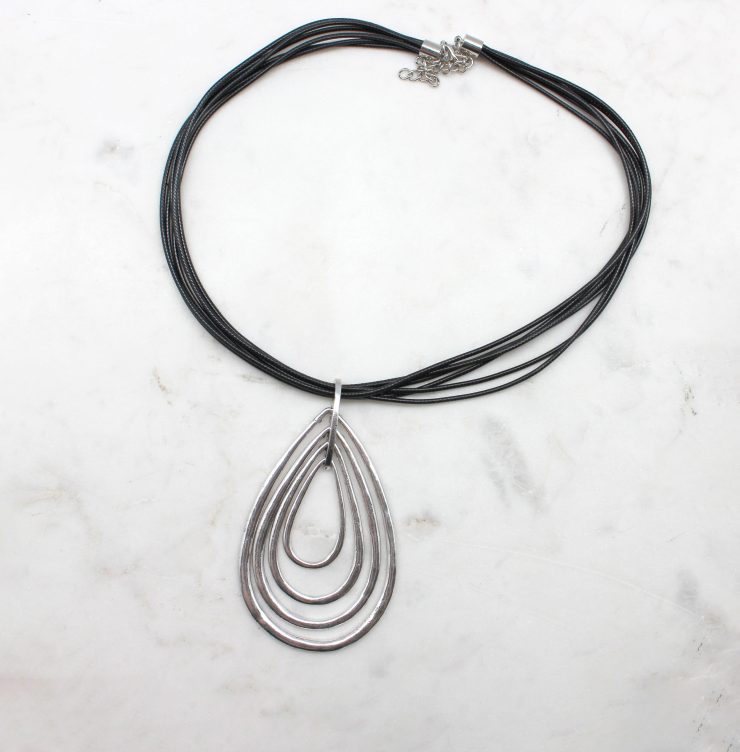 A photo of the Falling Raindrops Cord Necklace product