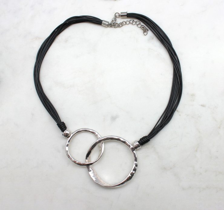 A photo of the Link It Up Cord Necklace product