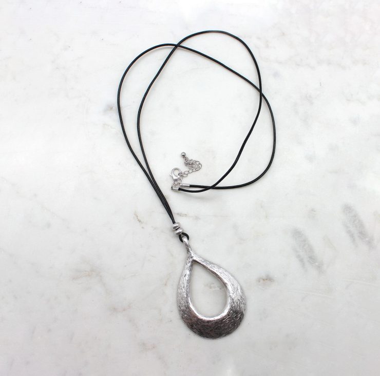 A photo of the Precious Teardrop Cord Necklace product