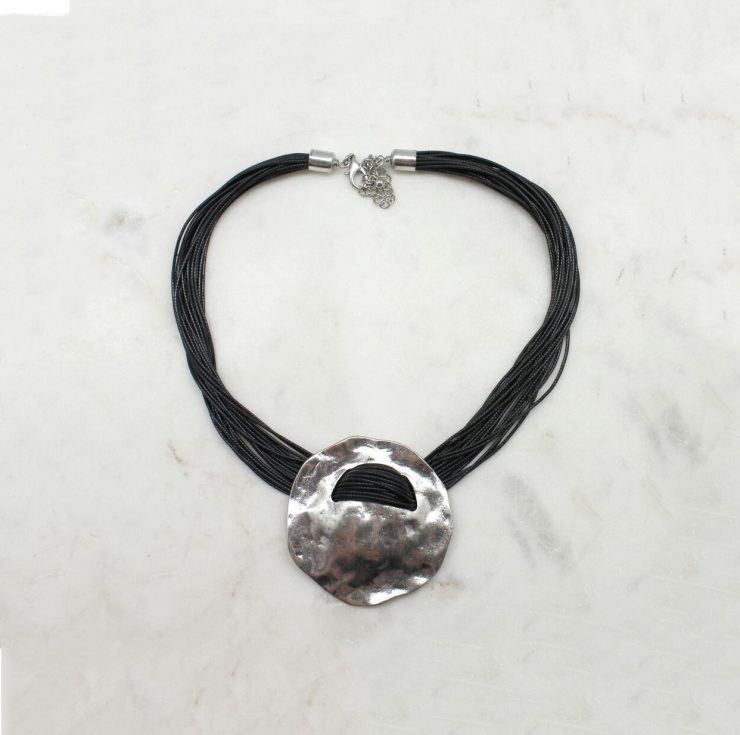 A photo of the Right on the Button Cord Necklace product