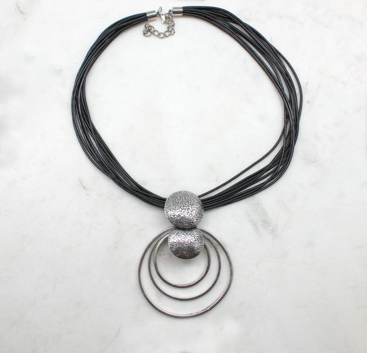 A photo of the Ringing In Style Cord Necklace product