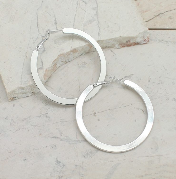 A photo of the Luxurious Look Hoop Earrings product