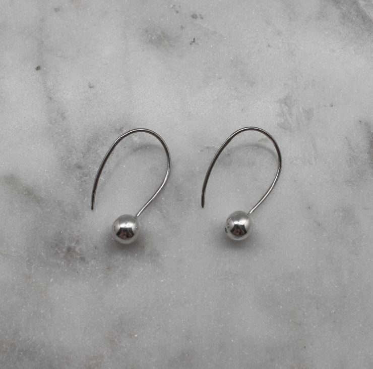 A photo of the Modern Gal Earrings product