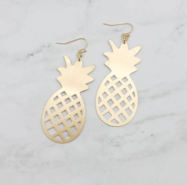 A photo of the Pineapple Perfection Earrings product