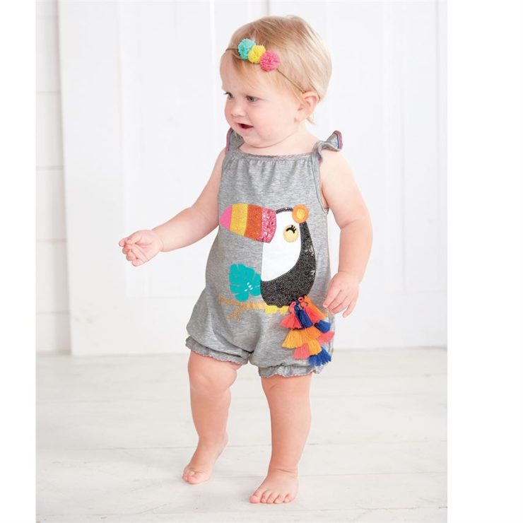 A photo of the Sequin Toucan Tassel Bubble Romper product