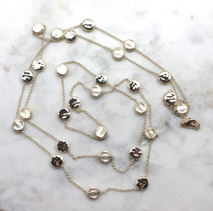 A photo of the Step By Step Necklace product