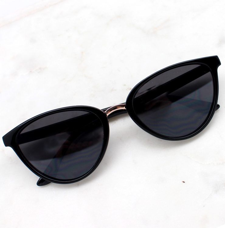A photo of the Under The Sol Sunglasses product