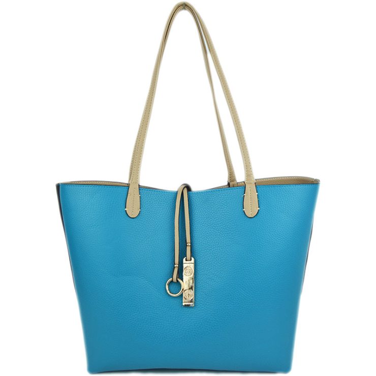 A photo of the Beige & Sky Blue Reversible Tote product