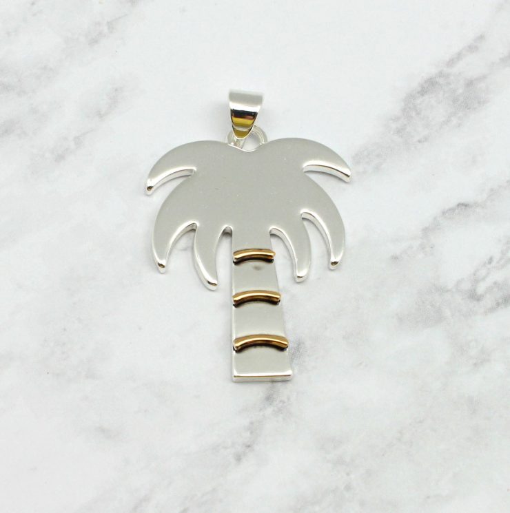 A photo of the Breezy Palm Pendant product