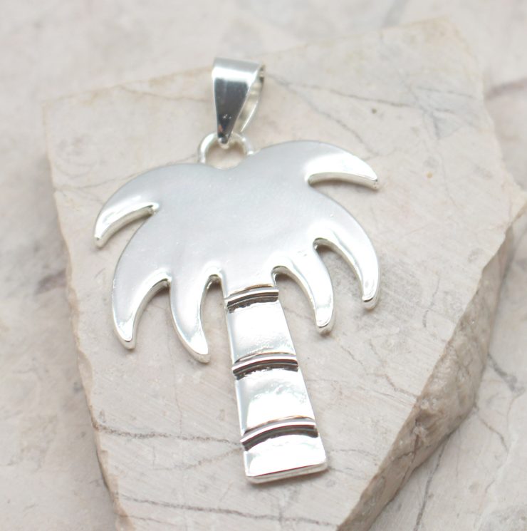 A photo of the Breezy Palm Pendant product