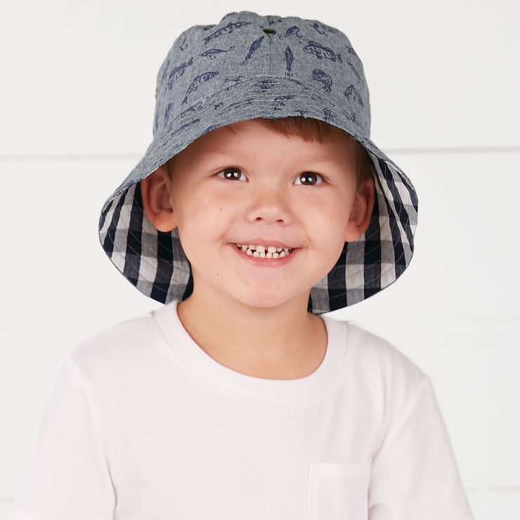 A photo of the Chambray Fish Print Reversible Bucket Hat product