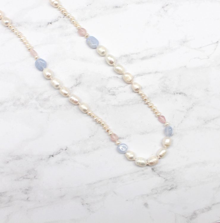 A photo of the Pretty Pearl Pastel Necklace product