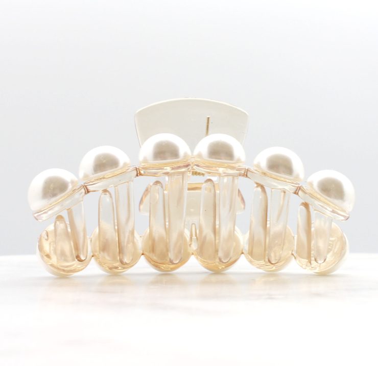 A photo of the Champagne Pearl Claw Clip product