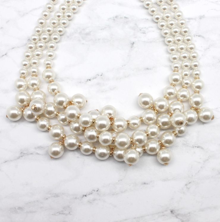 A photo of the Pearl Puzzle Necklace product