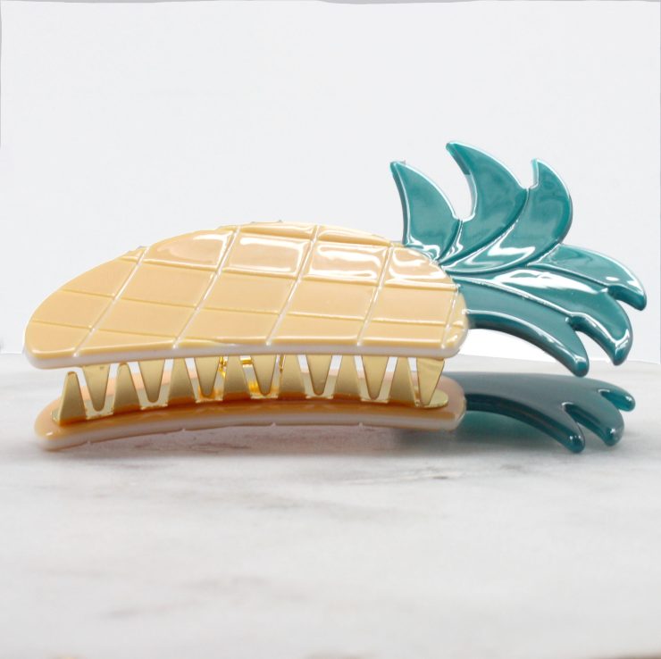 A photo of the Pineapple Princess Clip product