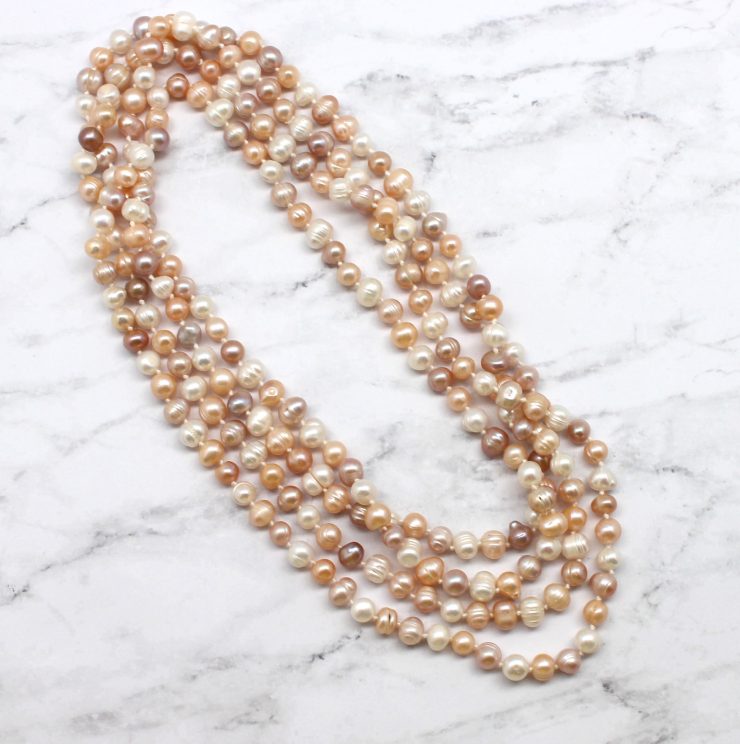 A photo of the Pretty Pink Pearl Necklace product