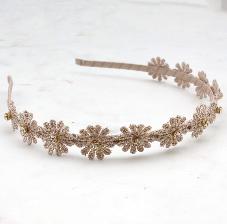 A photo of the Quilted Flowers Headband product