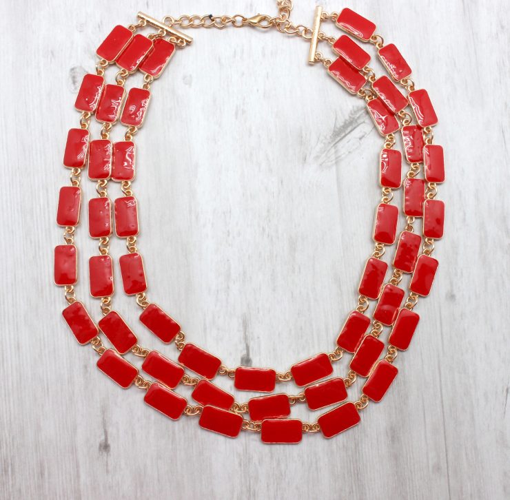 A photo of the Red Rectangles Necklace product