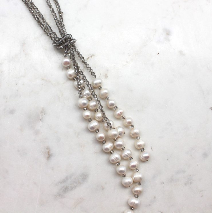 A photo of the Take On The Night Necklace product