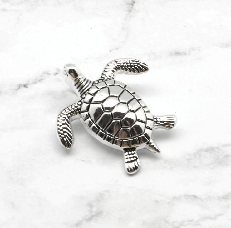 A photo of the Terrific Turtle Pendant product