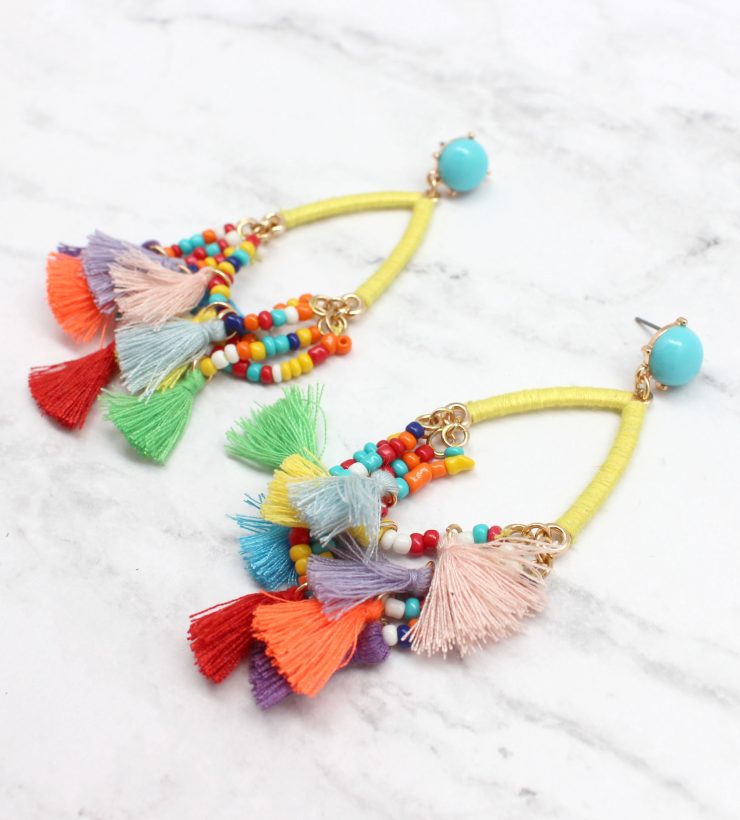 A photo of the Delicate Duster Earrings product