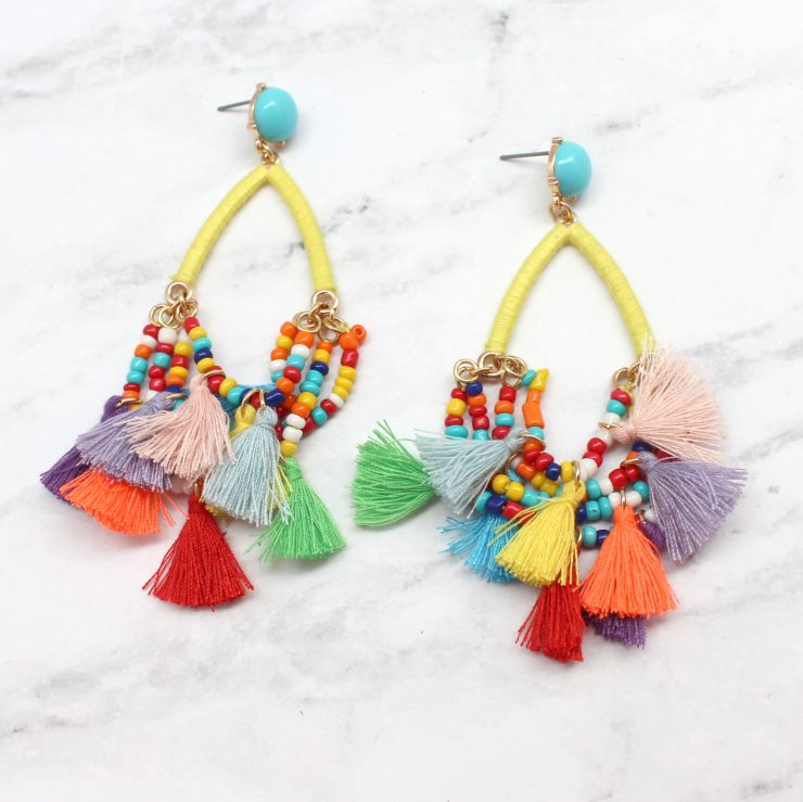 A photo of the Delicate Duster Earrings product