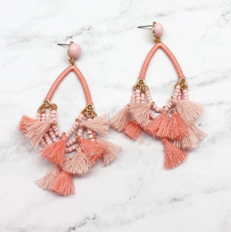 A photo of the Delicate Duster Earrings product