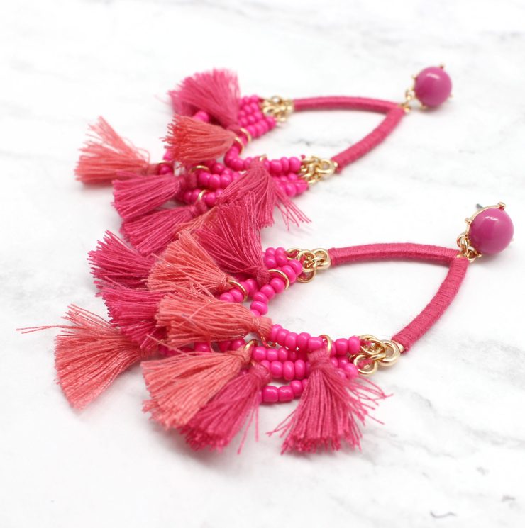 A photo of the Delicate Duster Earrings product