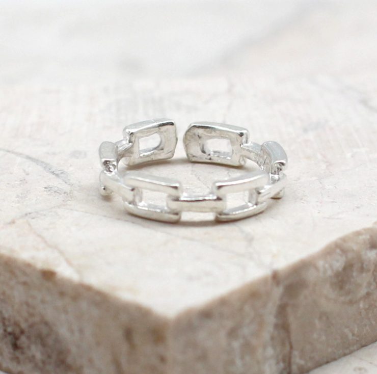 A photo of the The Link Toe Ring product