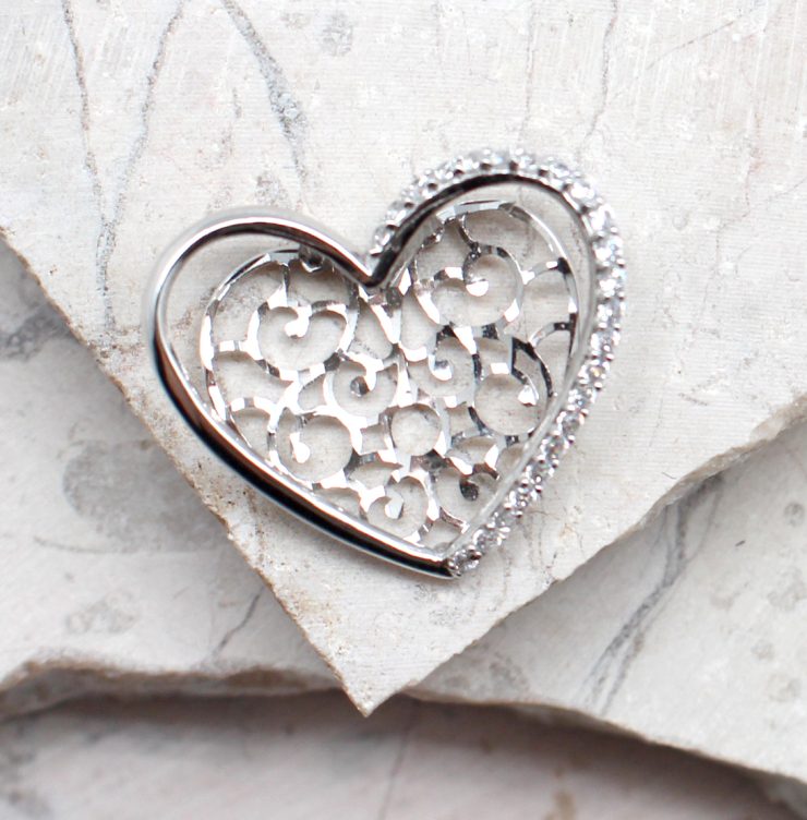 A photo of the The Cut Out Heart Pendant product