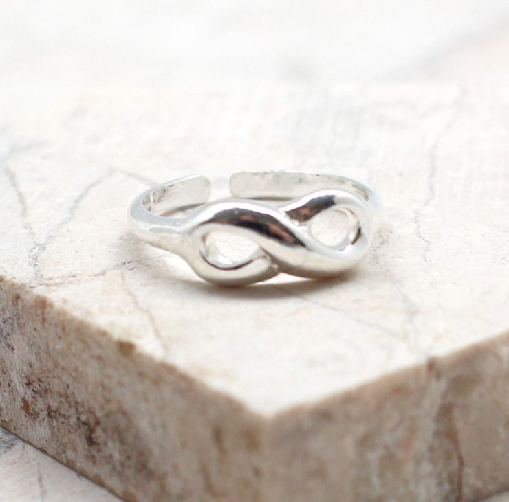 A photo of the The Infinity Toe Ring product