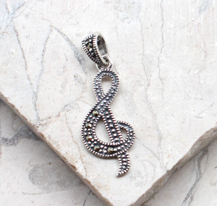 A photo of the The Marcasite Music Note Pendant product