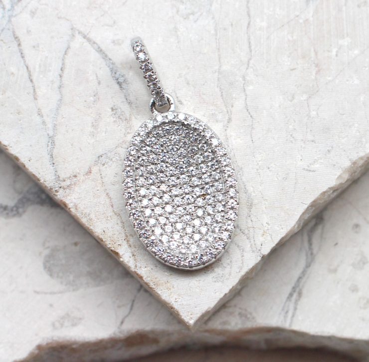 A photo of the The Pave Oval Pendant product