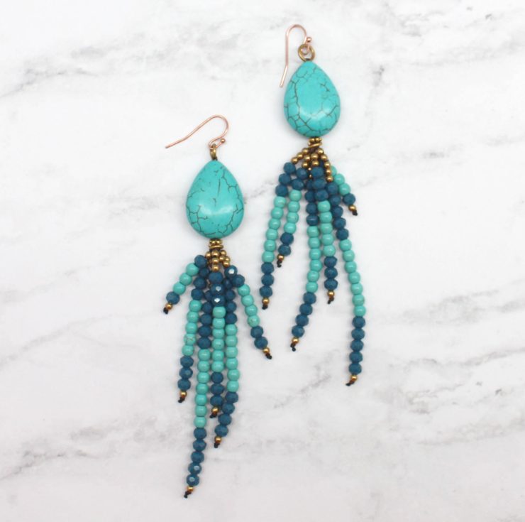 A photo of the Walk With Me Earrings product