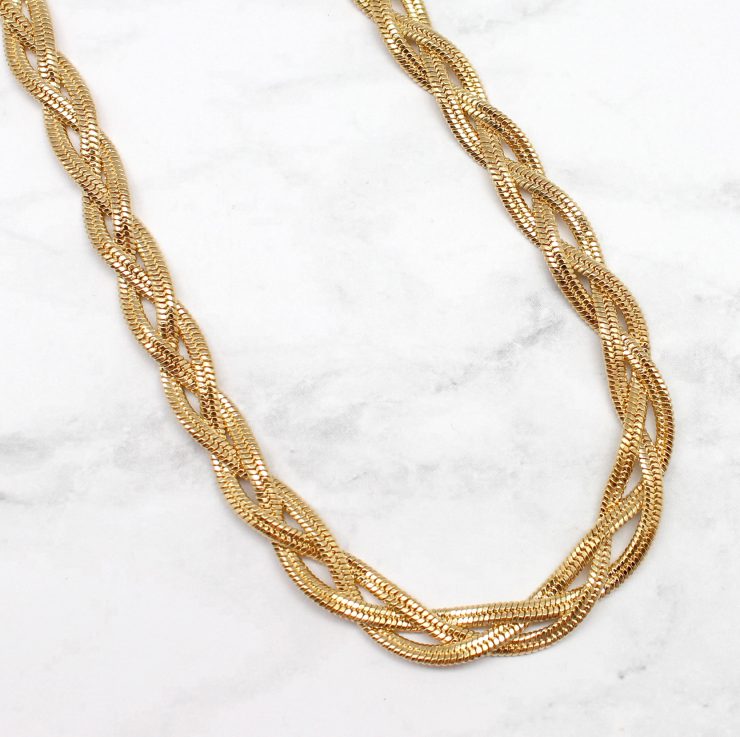 A photo of the Braided and Beautiful Necklace product