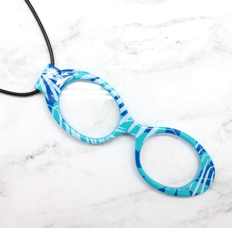 A photo of the Magnifying Glasses Necklace product