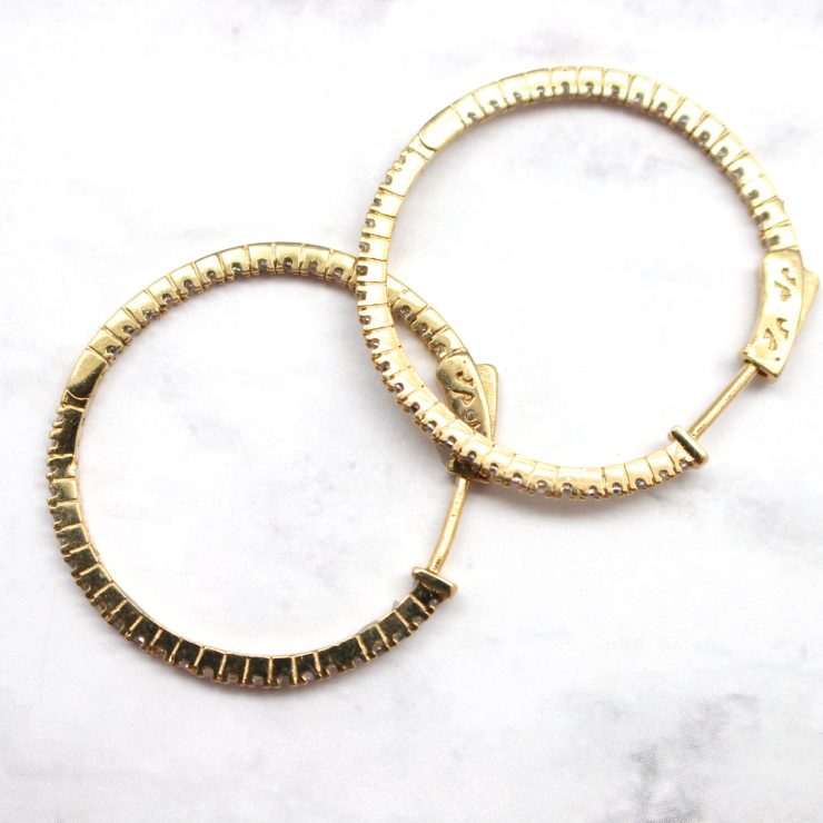 A photo of the Simple Gold CZ Hoops product