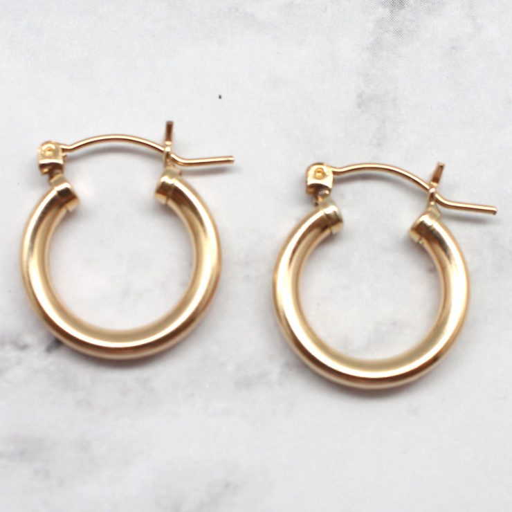 A photo of the Simple Gold Hoops product