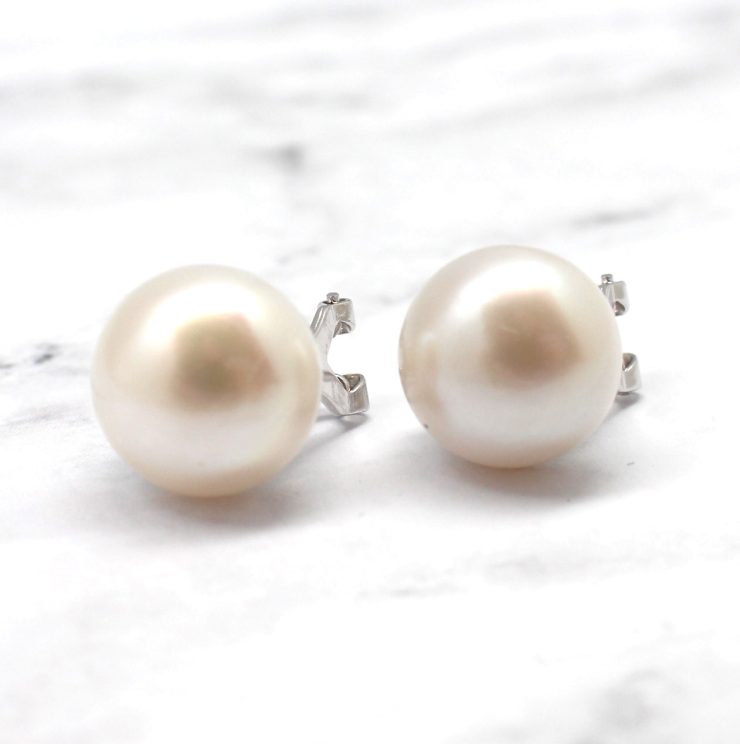 A photo of the The Simple Pearl Earring product