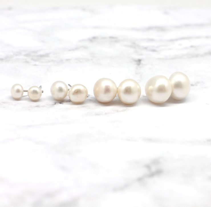 A photo of the The Taya Pearl Earring product