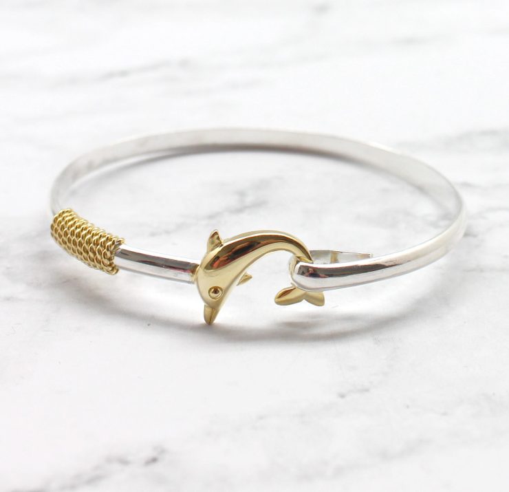 A photo of the Dolphin Bangle product