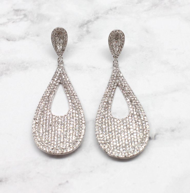 A photo of the Down The Aisle Earrings product
