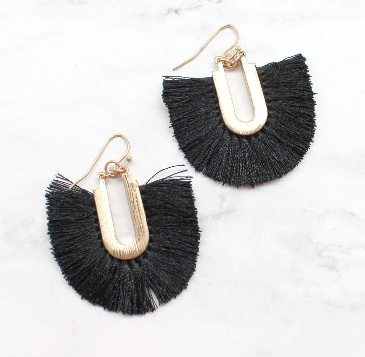 A photo of the Frilly Fringe Earrings product